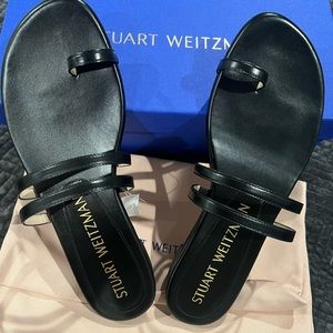 Black Stuart Weitzman slippers. Brand new, never been worn.